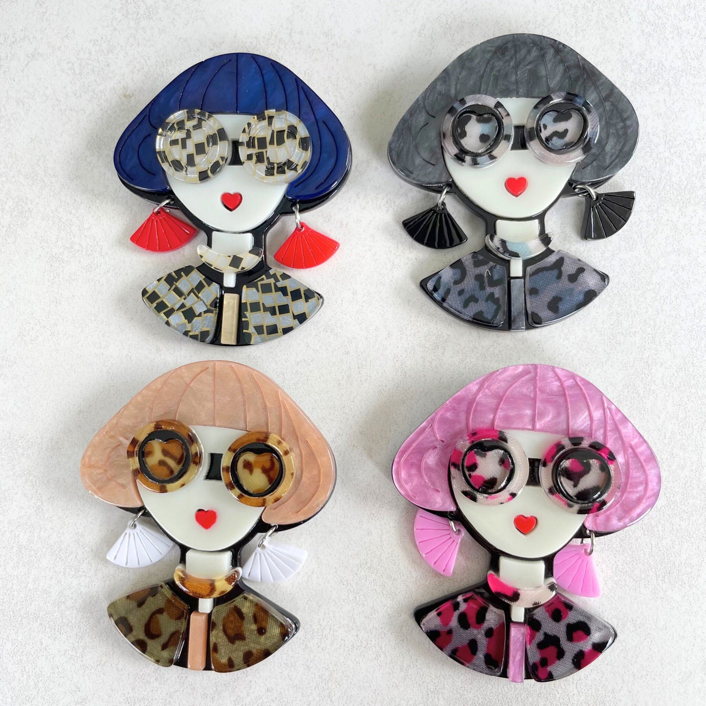 Art Deco lady with blue hair and large sunglasses acrylic pin brooch