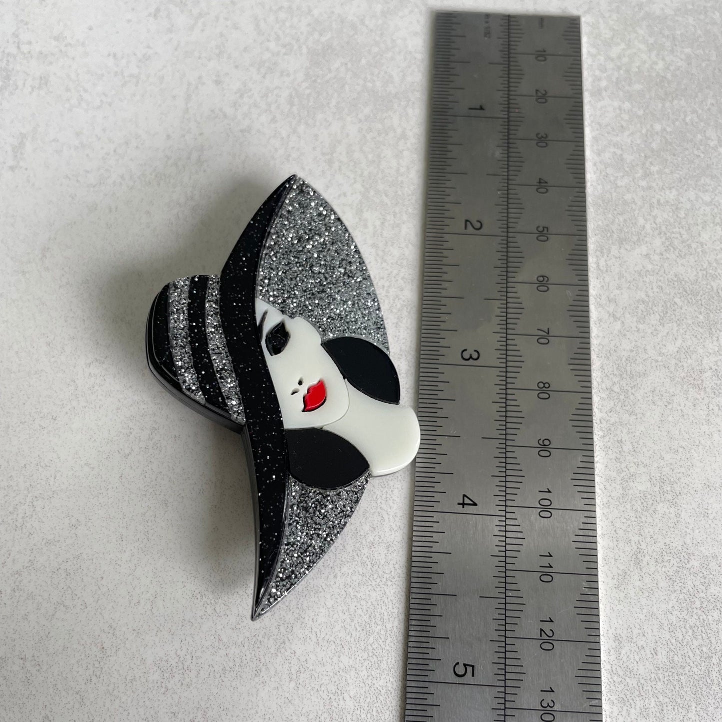 Art Deco lady with large glitter hat acrylic pin brooch
