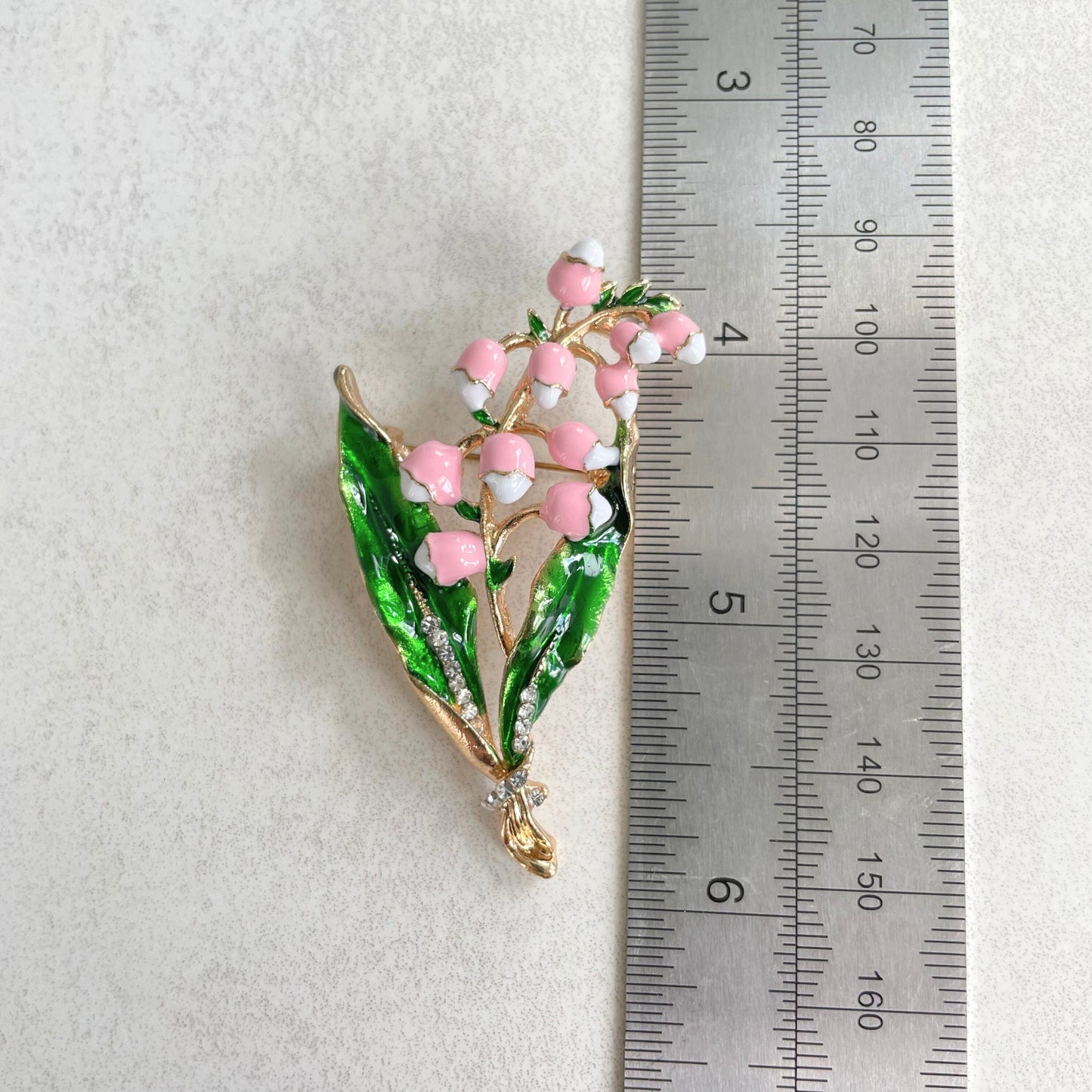 Delicate Lily of the valley flower gold pin brooch