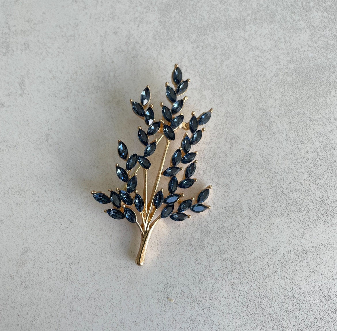 Blue sapphire tree branch gold and silver brooch