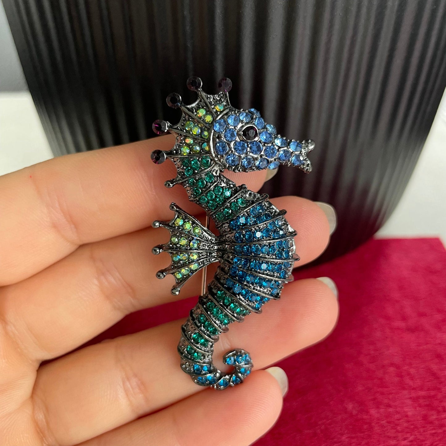 Green and blue seahorse pin brooch