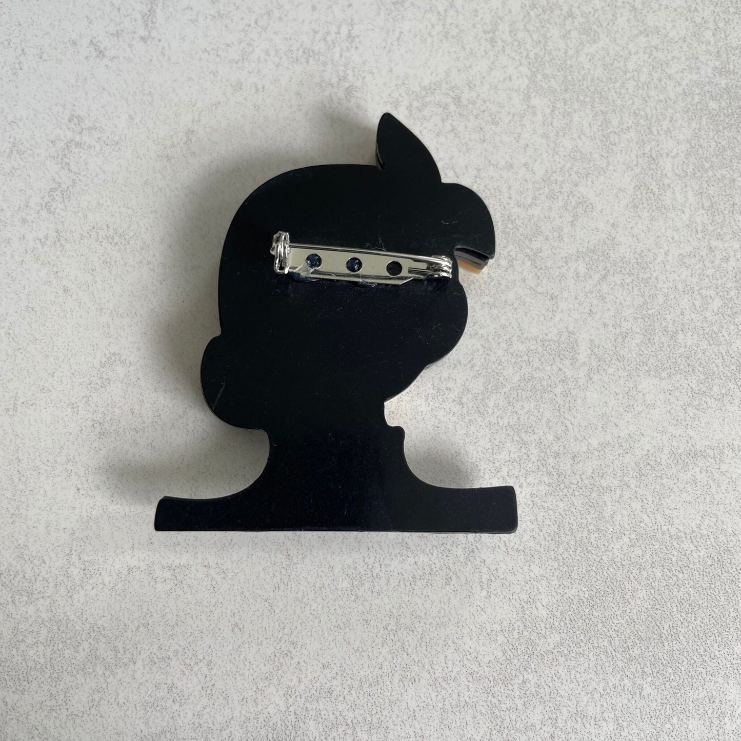 Art Deco lady with brown headscarf acrylic pin brooch