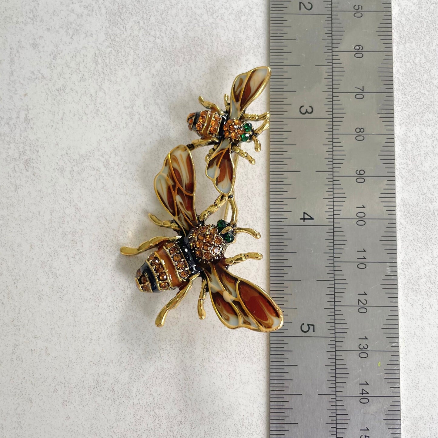 Double bee gold pin brooch