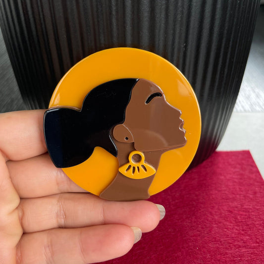 Art Deco African lady orange acrylic pin brooch