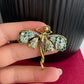 Delicate green enamel fairy gold pin brooch