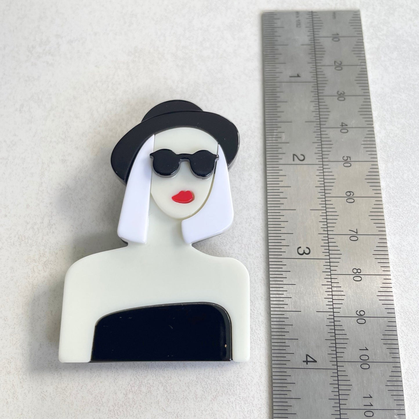 Art Deco modern lady with sunglasses and black har acrylic pin brooch