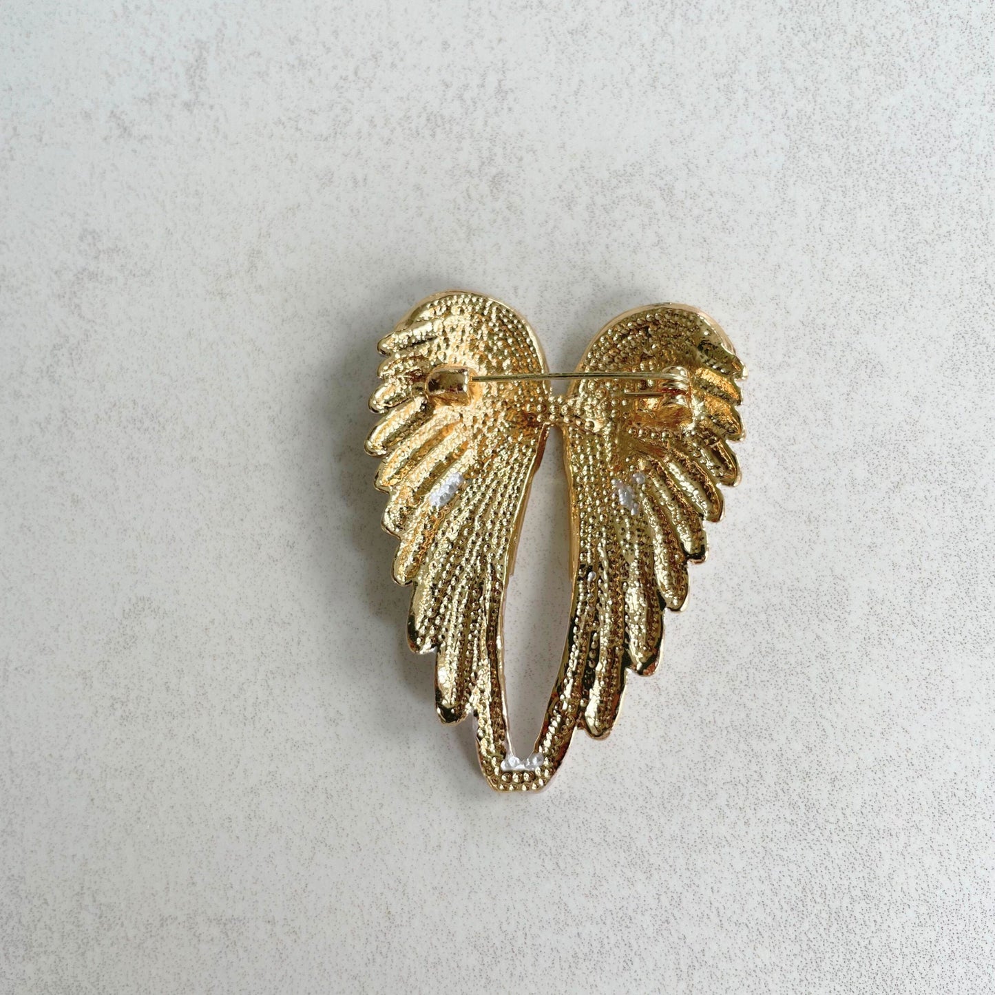 Delicate white enamel angel wings gold pin brooch