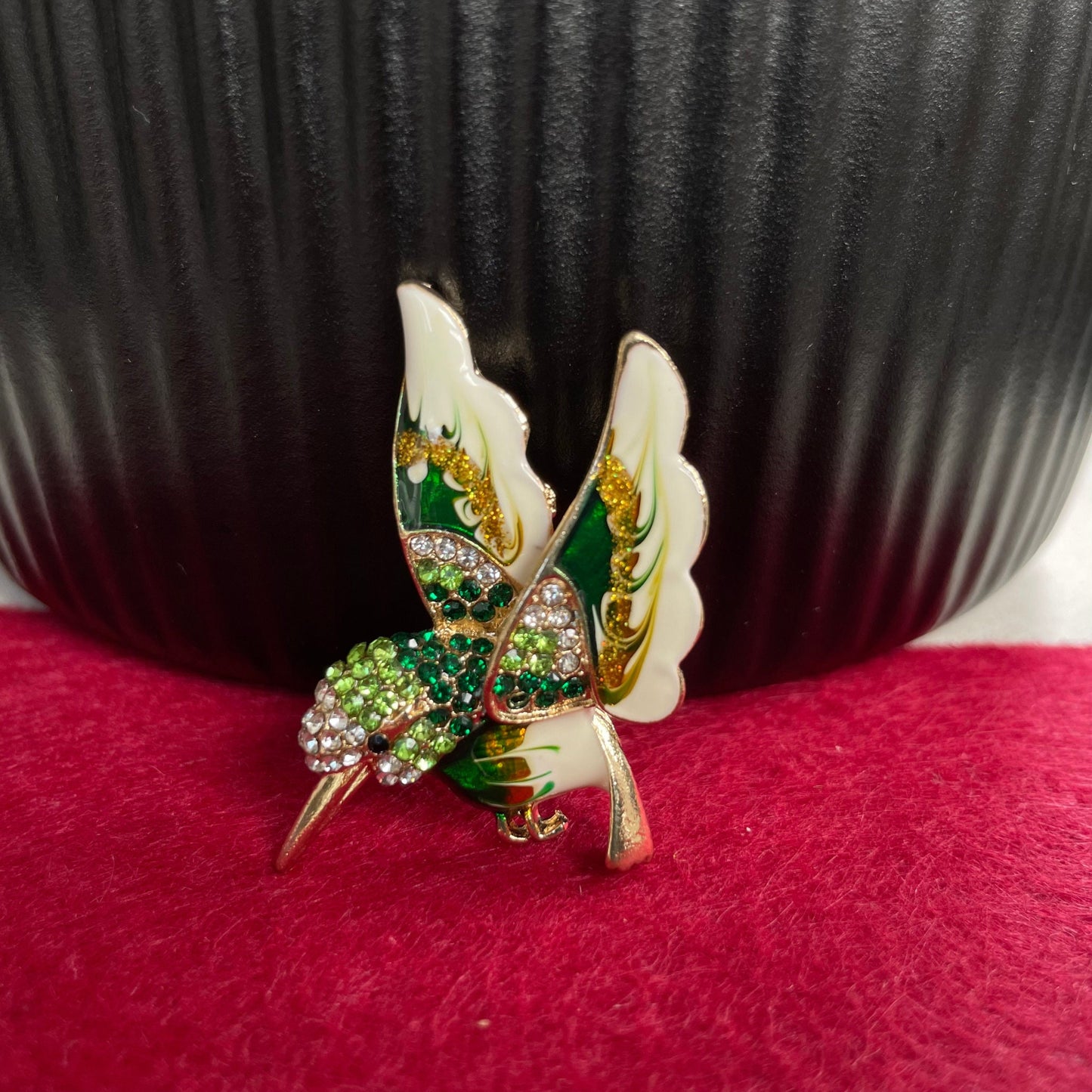 Delicate green hummingbird gold pin brooch