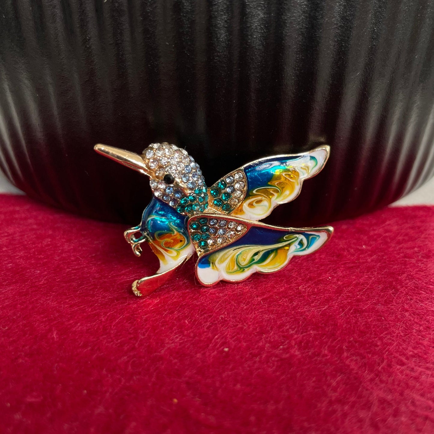 Delicate green hummingbird gold pin brooch