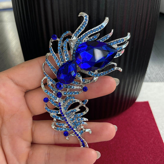 Statement sapphire feather silver pin brooch