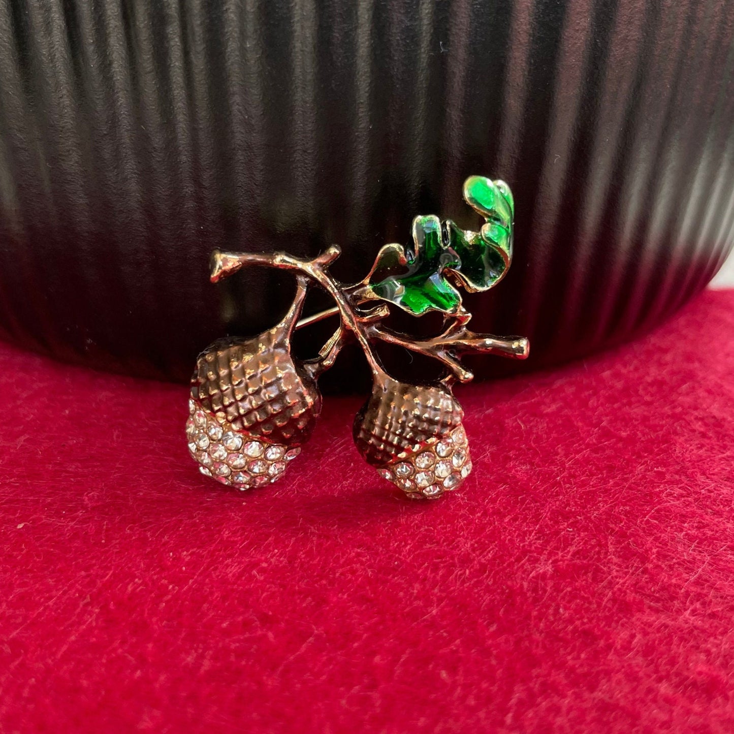 Dainty brown enamel acorn brooch