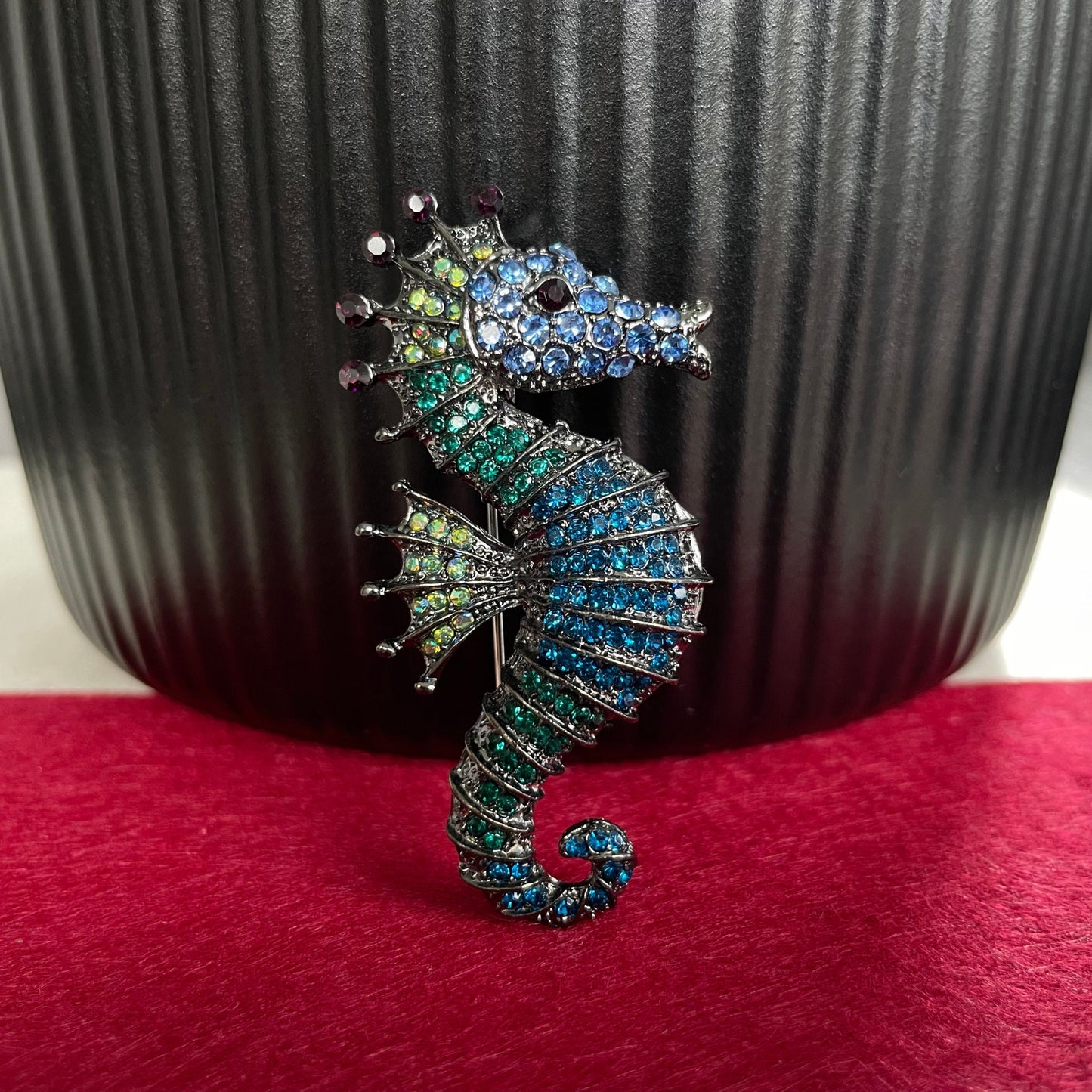 Green and blue seahorse pin brooch