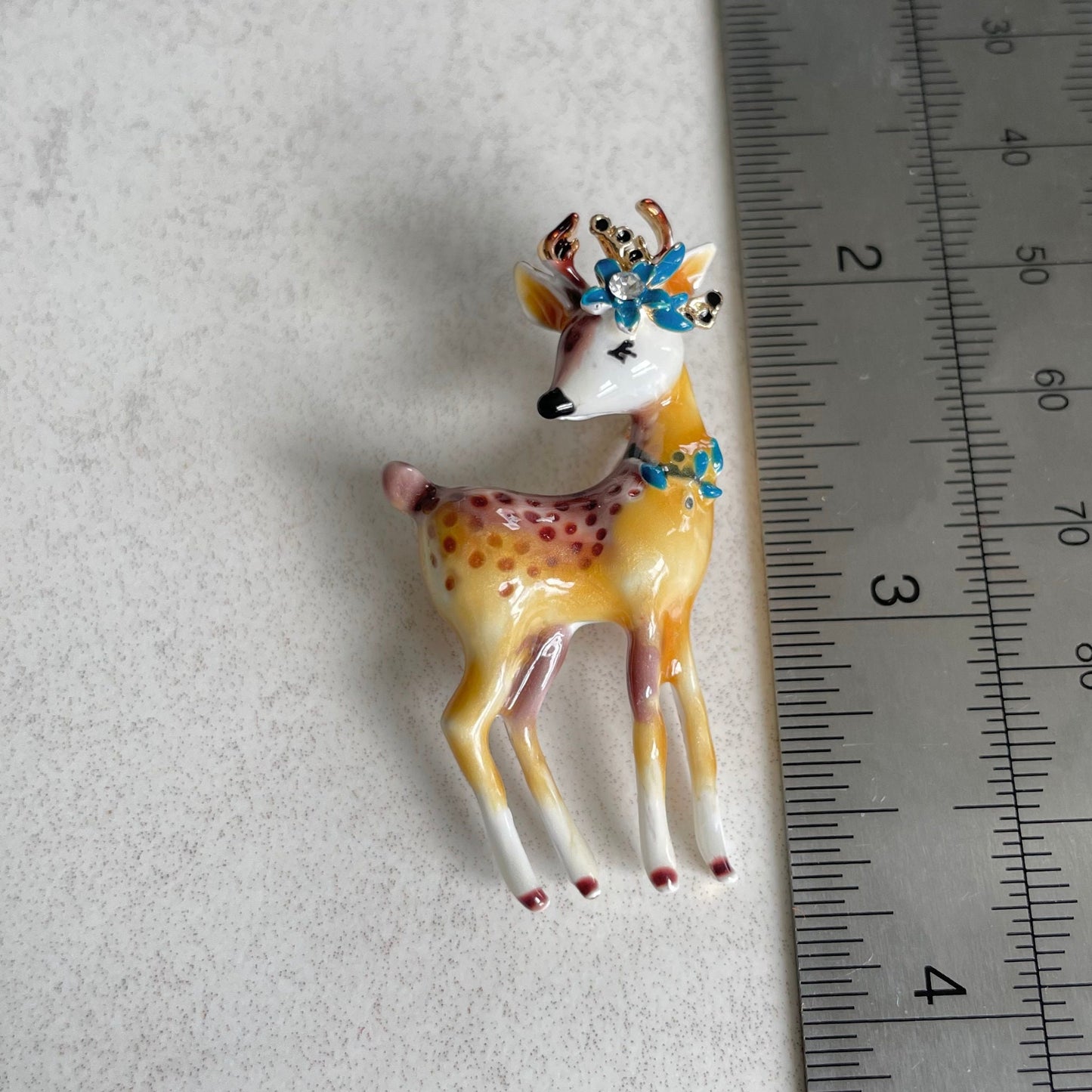 Cute enamel reindeer blue flower gold pin brooch