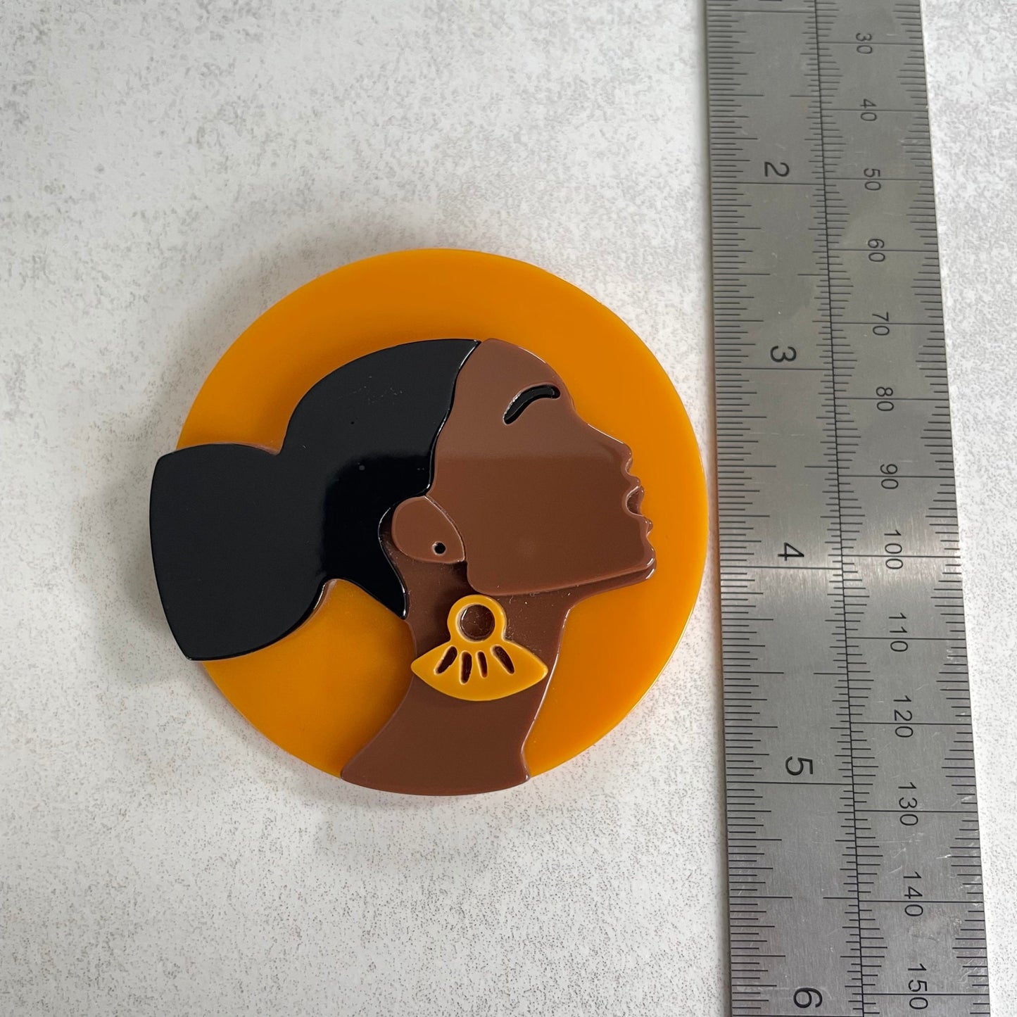 Art Deco African lady orange acrylic pin brooch