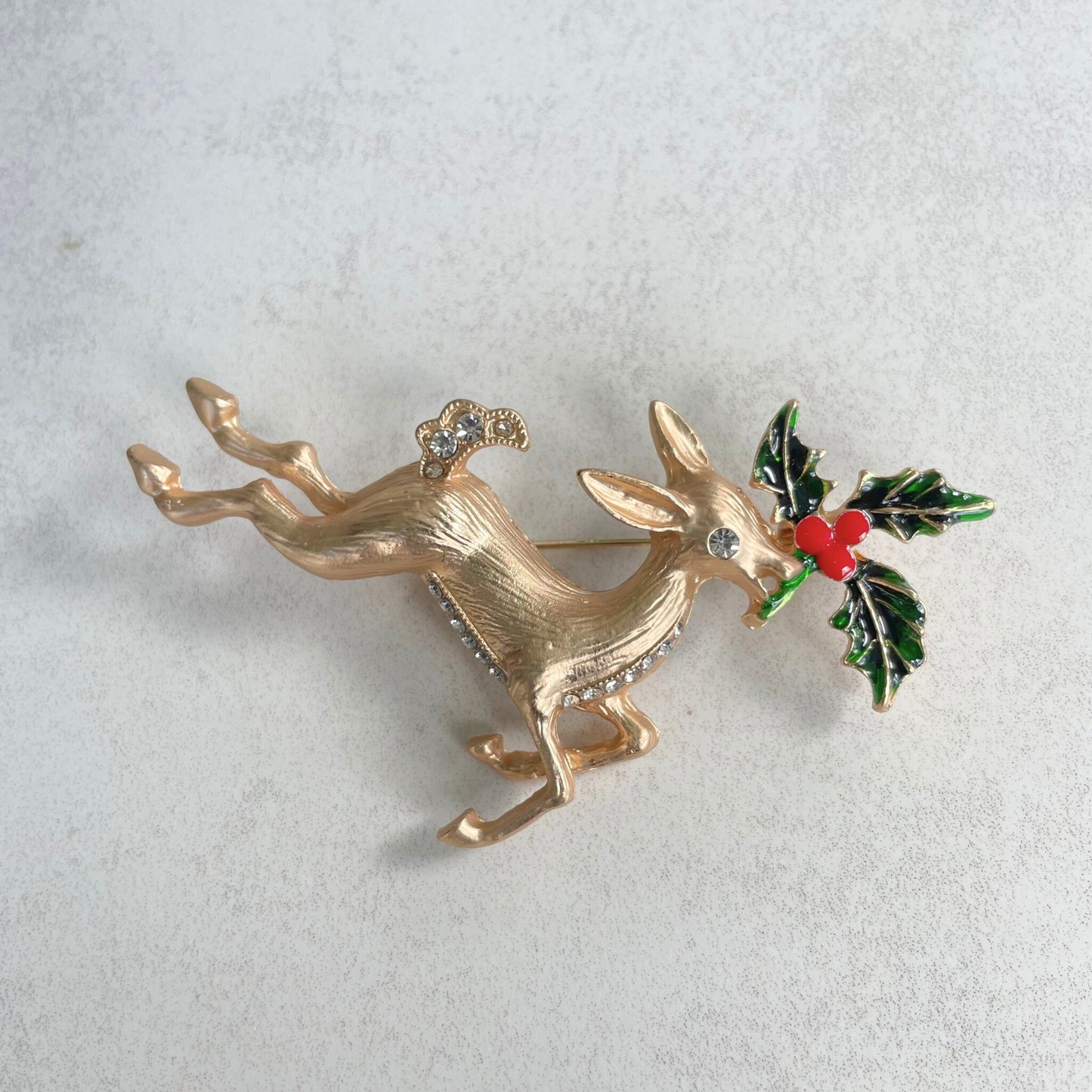 Charming reindeer Holly flower gold pin brooch