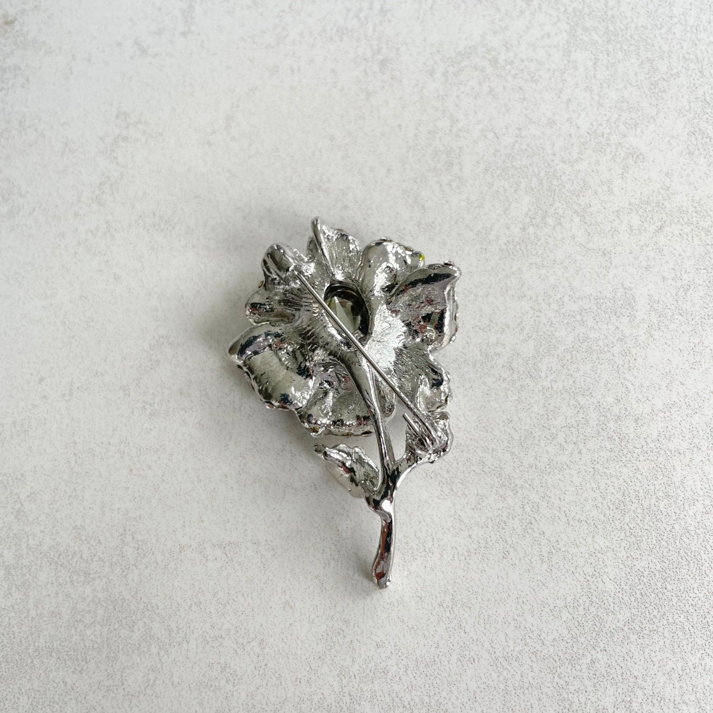 Delicate blue crystal flower silver pin brooch