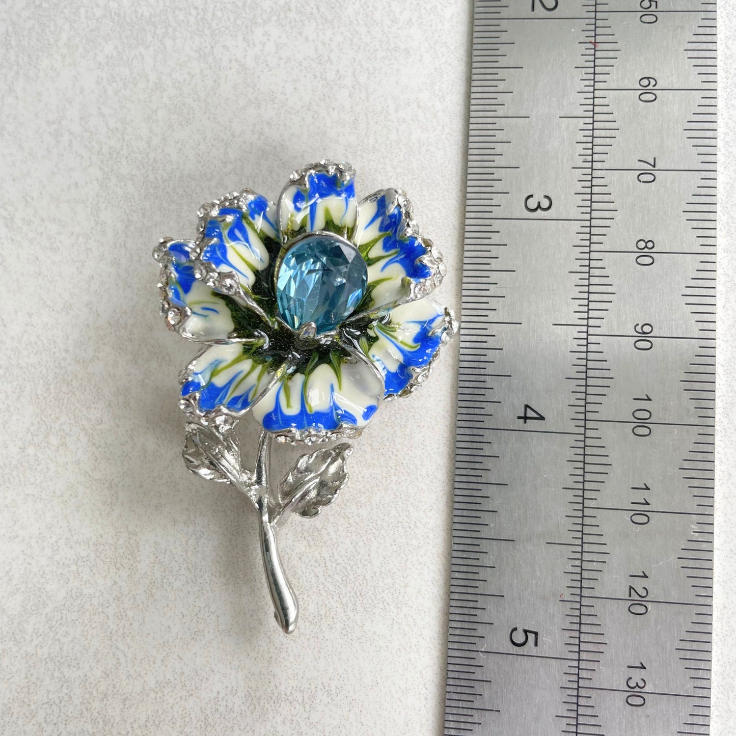 Delicate blue crystal flower silver pin brooch