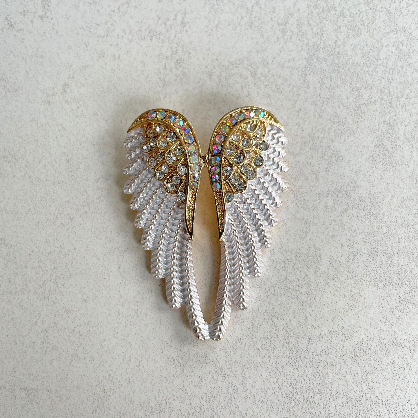 Delicate white enamel angel wings gold pin brooch