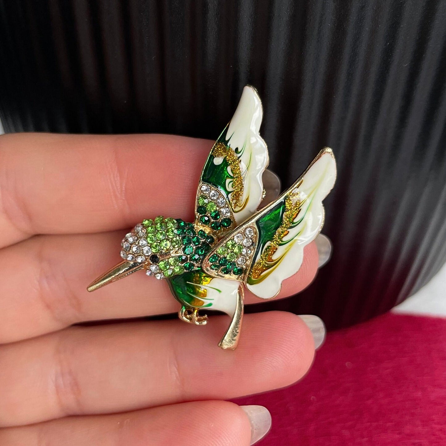 Delicate green hummingbird gold pin brooch