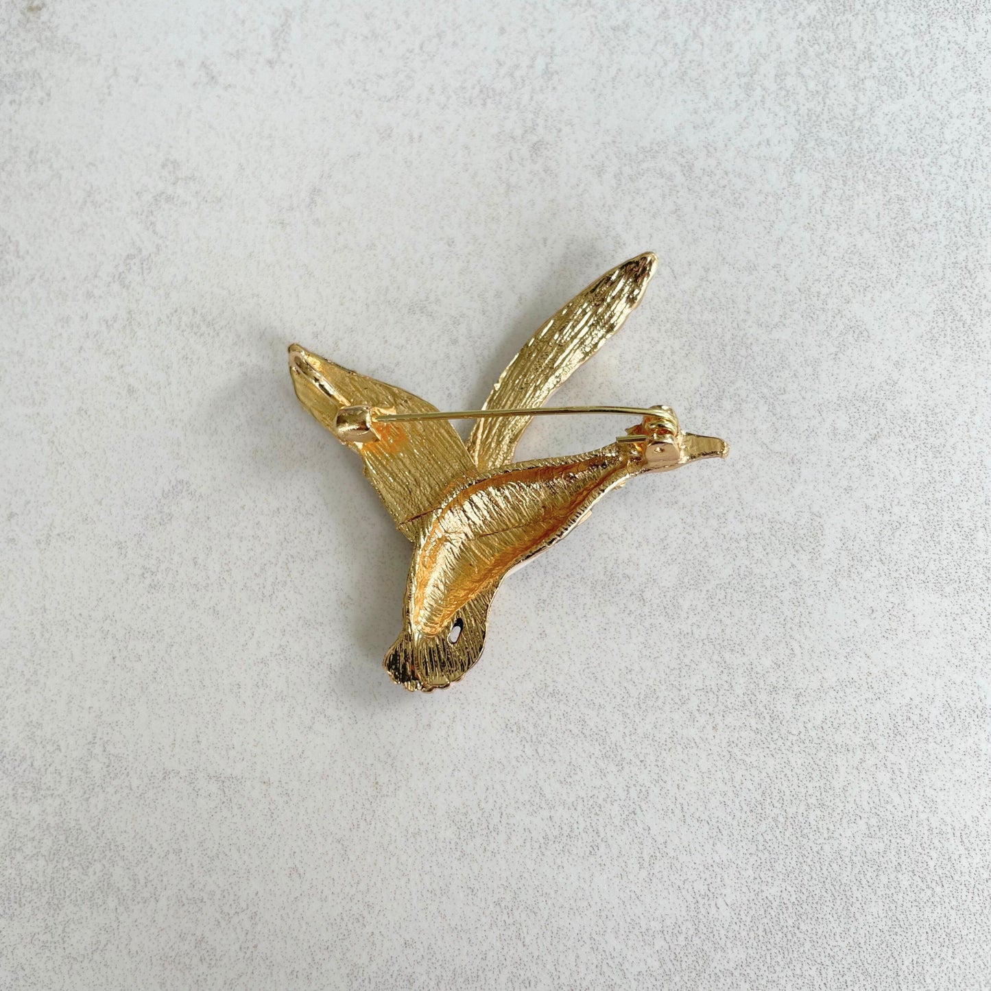 Enamel flying duck gold pin brooch