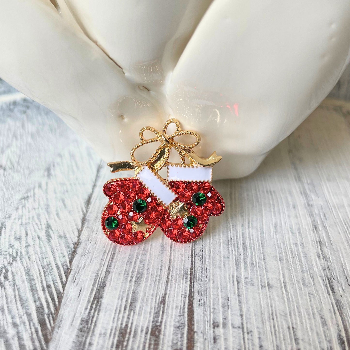 Charming Christmas gloves gold pin brooch