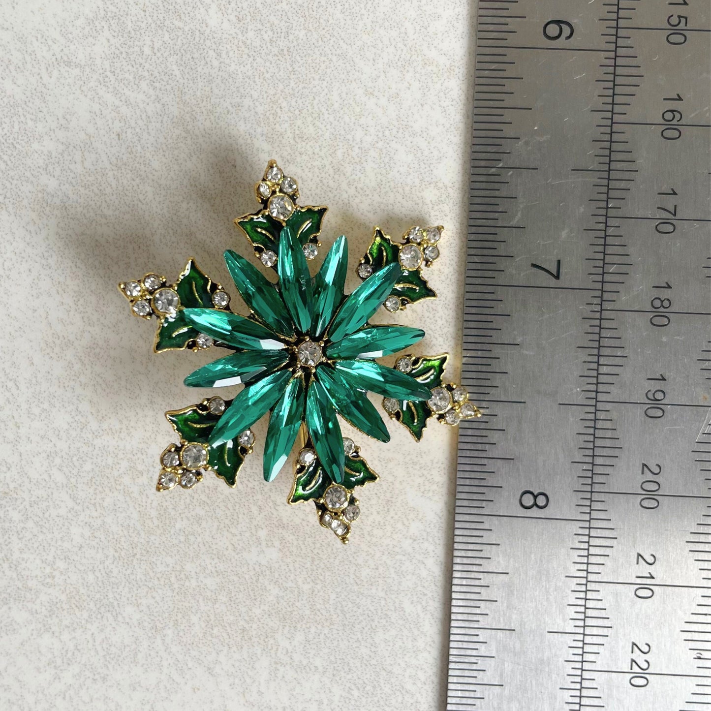 Green emerald crystal snowflake gold pin brooch